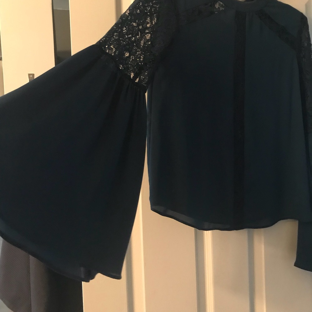 UNWORN BLOUSE